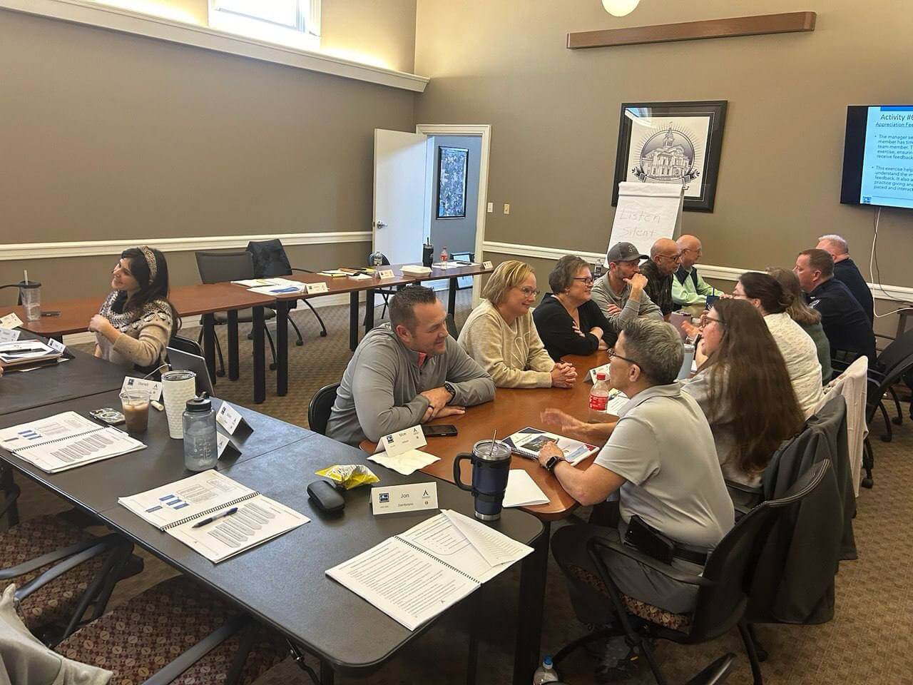 Leadership Strategies Group event showing participants in an interactive group activity